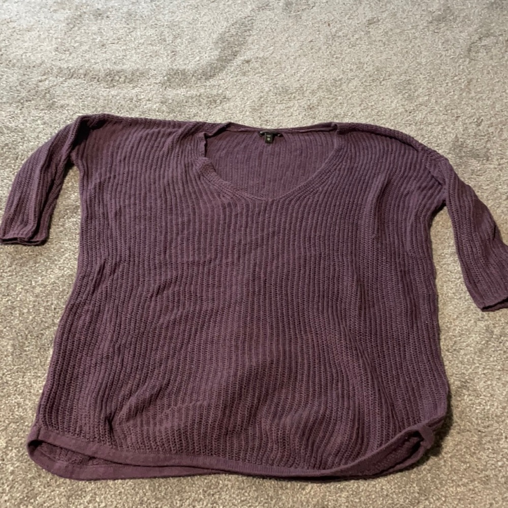 V-neck knit sweater.